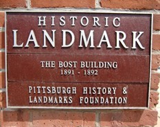 Plaque naming the Bost Building a National Historic Landmark