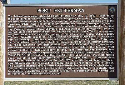 A historical marker near the side of the road tells the history of the fort. 