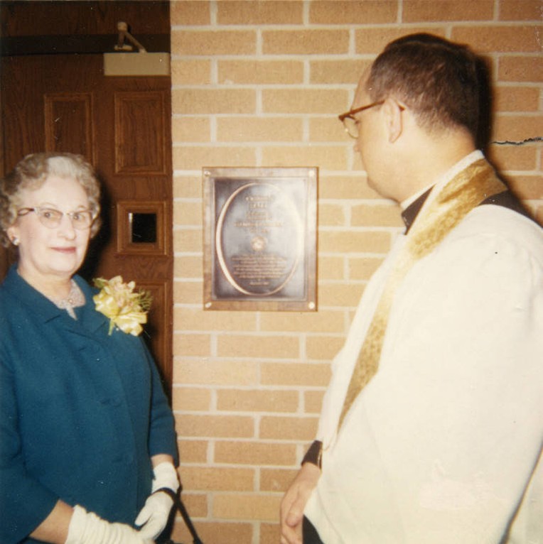 Mrs. Charles Cobeen poses with Rev. John P. Raynor, S.J. at the dedication of Cobeen Hall, 1966 (“Department of Special Collections and University Archives, Marquette University Libraries, MUA_CB_01104)