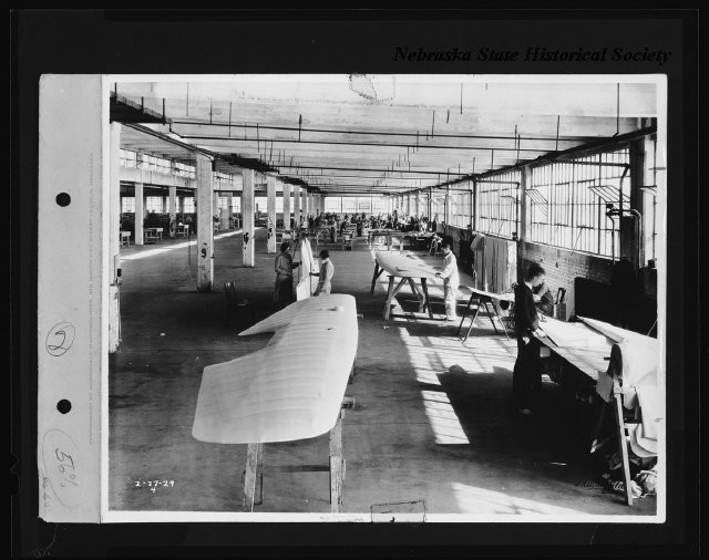 Covering wings with fabric at the Arrow Aircraft Company, Lincoln, NE