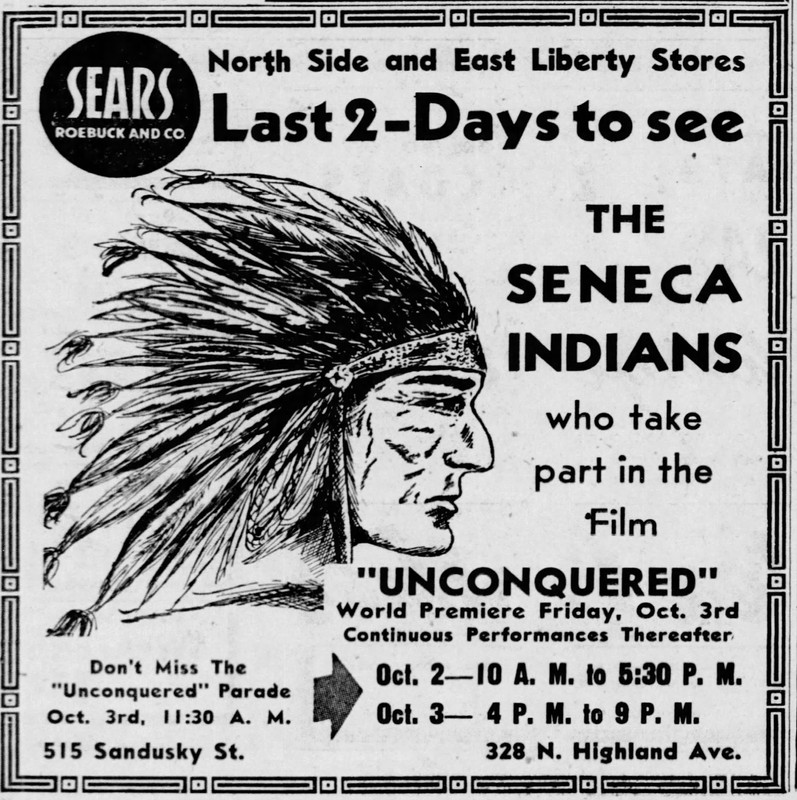 Advertisement for the Seneca Village erected at Sears-Roebuck to publicize the premiere of Unconquered.