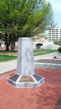 The marker is located on the grounds of the capitol building.