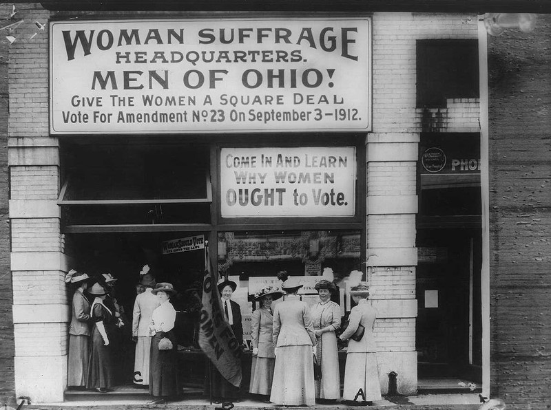 Woman Suffrage Headquarters, Cleveland; A (at extreme right) Miss Belle Sherwin, President, National League of Women Voters; B (holding the flag) Judge Florence E. Allen; C Mrs. Malcolm McBride