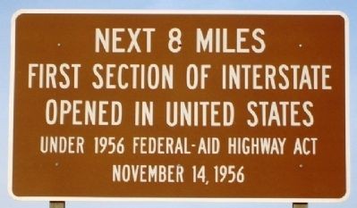 The marker indicating the location where the first section of the interstate highway was built.