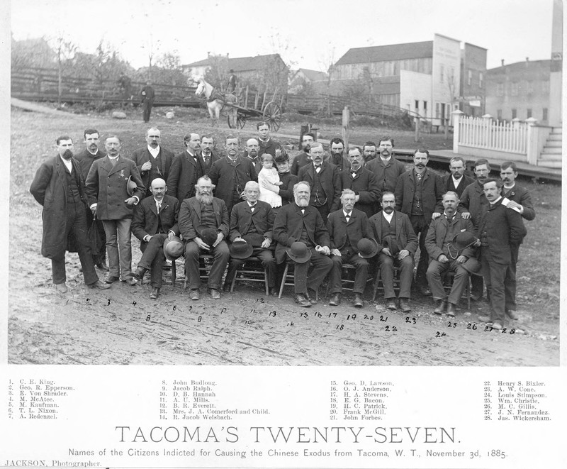 A group photograph of the original 27 Tacoma men indicted for the events of November 3rd, 1885.