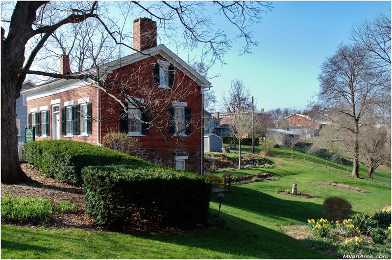 Side of home and backyard