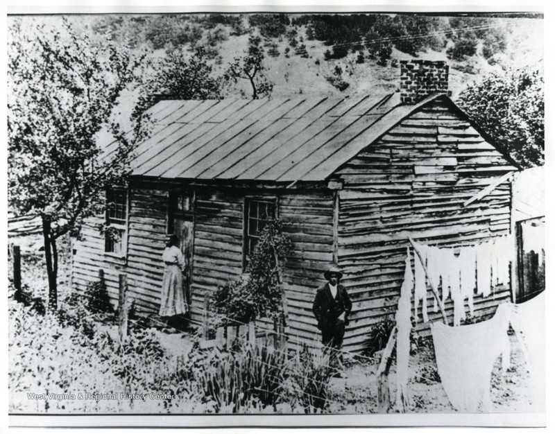 Home of Booker T. Washington - a replica of this cabin now stands behind the church