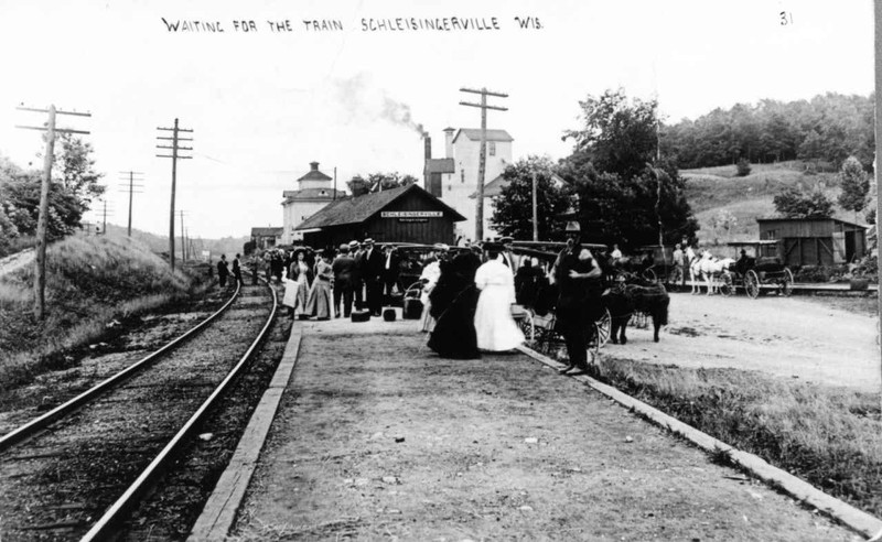 Passengers waiting for the train in Schleisingerville