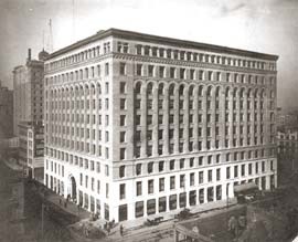 A historical shot of the building and surrounding landscape.