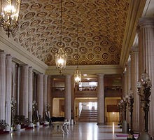 The lobby of the Opera House features ornate interior elements.