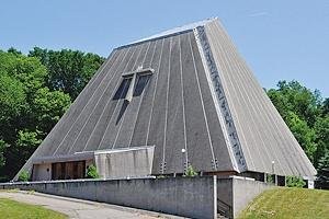 Sacred Heart Church was known colloquially as "the concrete tent" and closed in 1997 due to spalling. 