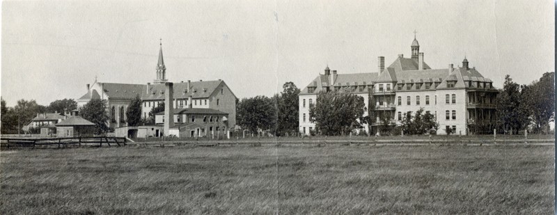 Panoramic view showing St. Agnes Hospital on the right, the convent in the center, and the two-story frame house that served as the original motherhouse on the far left.