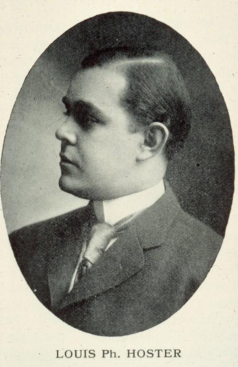 Louis Ph. sitting while looking to the left showing his profile in a suit with a tie.