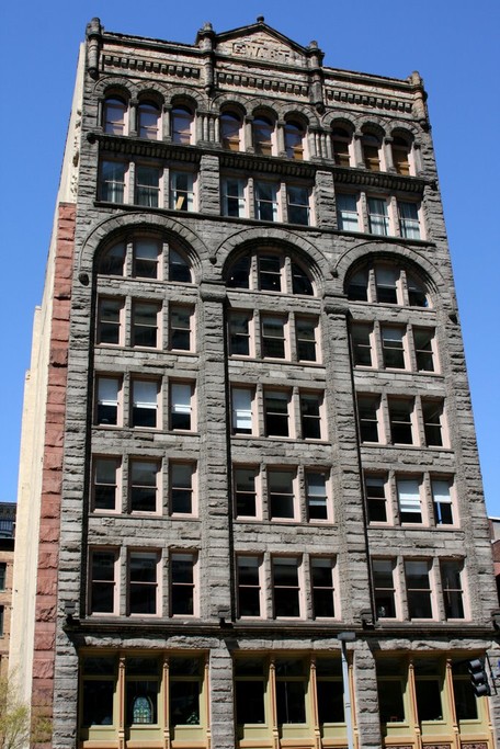 The Ewart Building was designed in the Richardson Romanesque style and was built in 1891.  