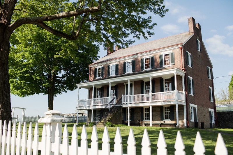 The Overholt homestead and childhood home of Henry Clay Frick is the oldest structure on site, built in 1838. Photo by West Overton Village.