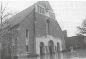 Church surrounded by floodwaters