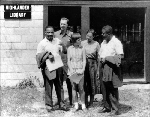 Martin Luther King, Rosa Parks, folk singer Pete Seeger, Reverend Ralph Abernathy, and Charis Horton attending a workshop at Highlander in 1957.