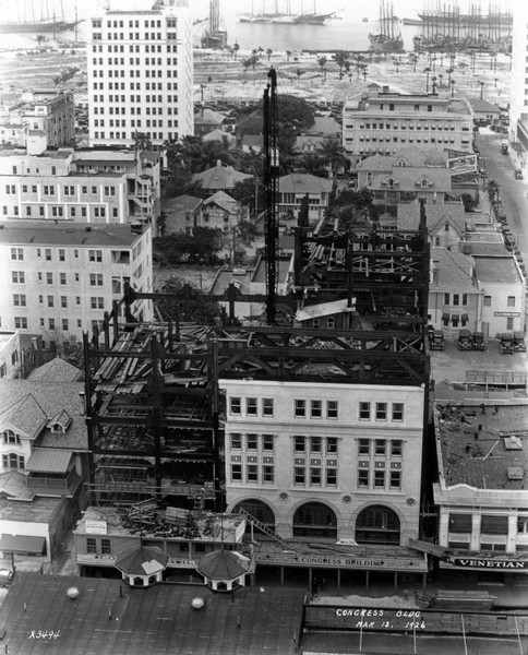 The Congress Building under construction in 1923. It was originally only five stories tall because Miami regulations banned any buildings more than ten stories tall. Image obtained from Pinterest.