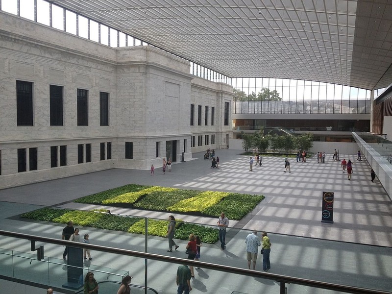 The atrium built in 2012 provides a shaded area over the space between the museum wings.