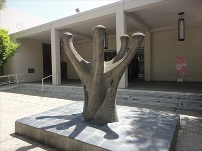 This large menorah sculpture stands in front of Temple Emanu El. Photo: Metro2, via Waymarking.com 