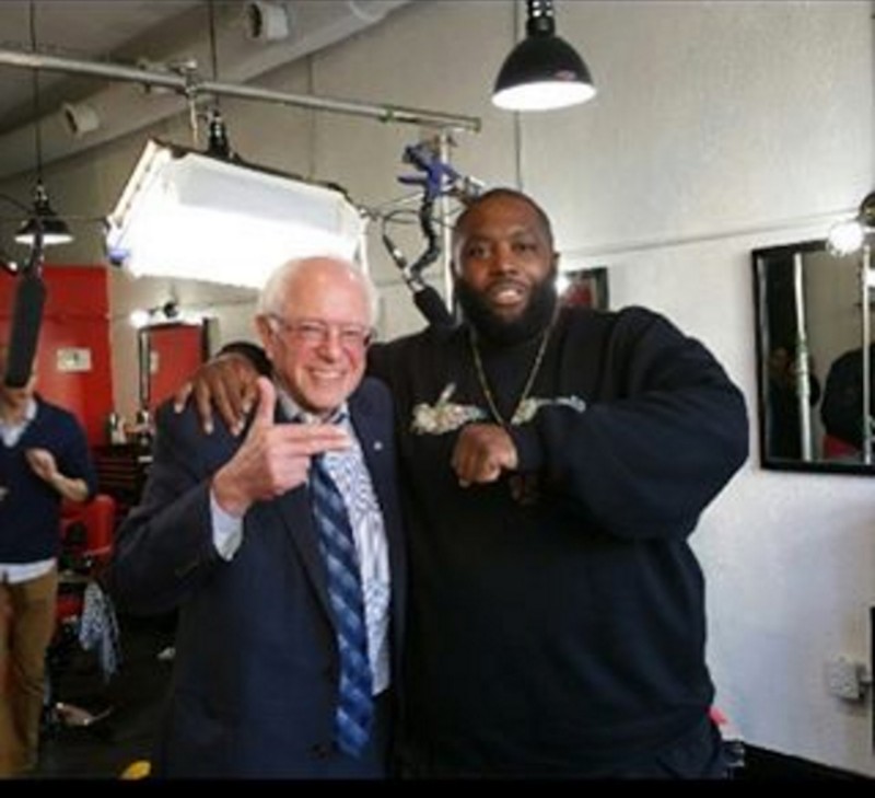 Bernie Sanders and Atlanta rapper Killer Mike making "Run the Jewels" sign at a 2016 presidential campaign rally on November 23, 2015