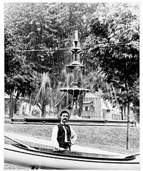 Photo of George King, a Janesville Druggist, in the Lower Courthouse Park. Circa early 1900s.