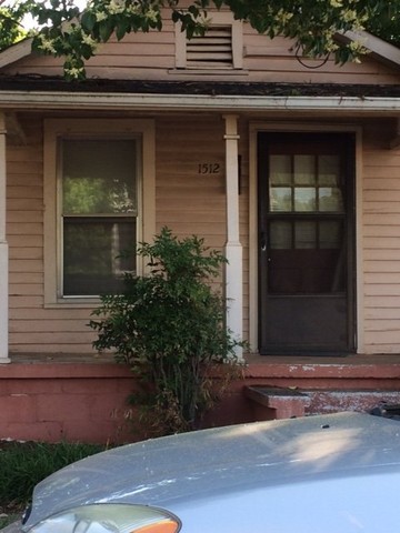 Historic (1925) Shotgun House in Roanoke Park Historic District. With Focus of Front Porch.
(Address: 1512 Sunrise Avenue, Raleigh NC)