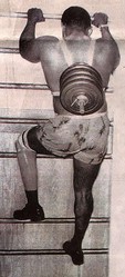 Carl Brashear climbing a ladder with weights attached to his back, part of the training he went through in preparation to be reinstated to diver.