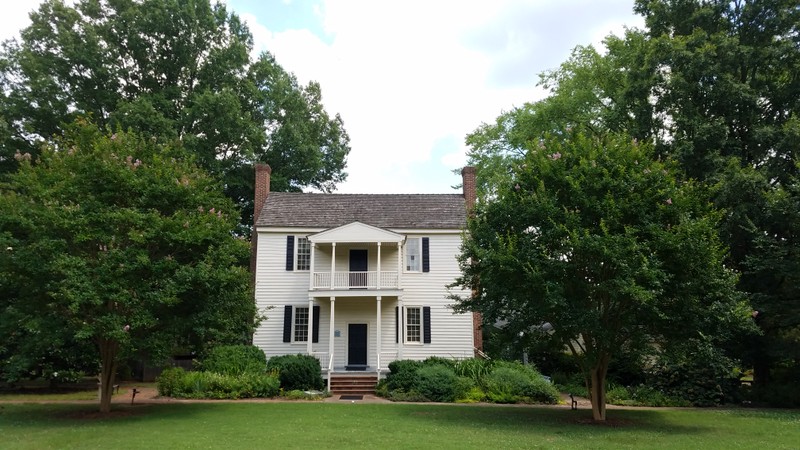 The original plantation house of Dr. Calvin Jones. After the college was founded, it was the home of Samuel Wait and his family, then was turned into a medical study building, then became a boys' dorm until the college's move to Winston-Salem.
