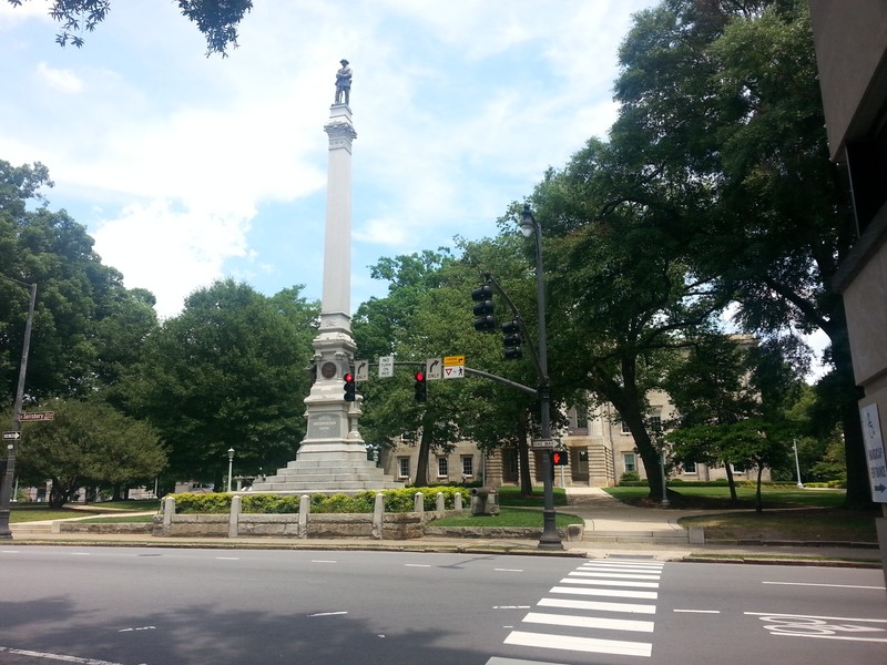 This a view of the Capitol from a street corner in downtown Raleigh.