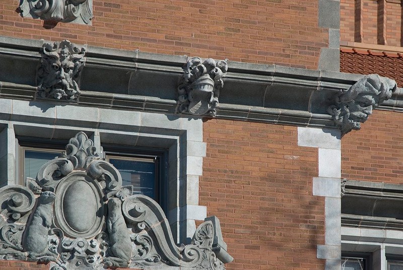 Terra cotta carvings of mythological figures and animals adorn the building