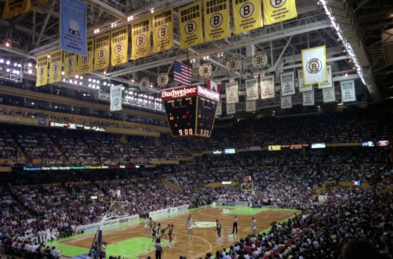 Boston Garden during a game in full color taken in the later years of the building's lifetime.