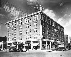 A black and white photo of the Hotel Maire.