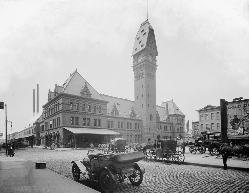 In 1922, a fire damaged the clock tower. This picture notes the pitched roof that existed prior to that fire. Photo provided by American-railway.com, but owned by Detroit Publishing Company. 