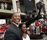 Ozzie and his daughter at the dedication of the statue