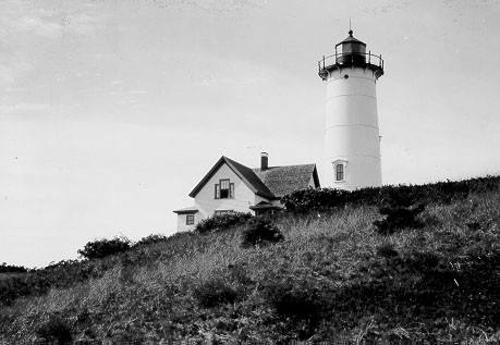 Nauset Light in Eastham, MA 1923, soon after its relocation from Chatham. The light was not painted with its iconic red and white daymark until the early 1940s.