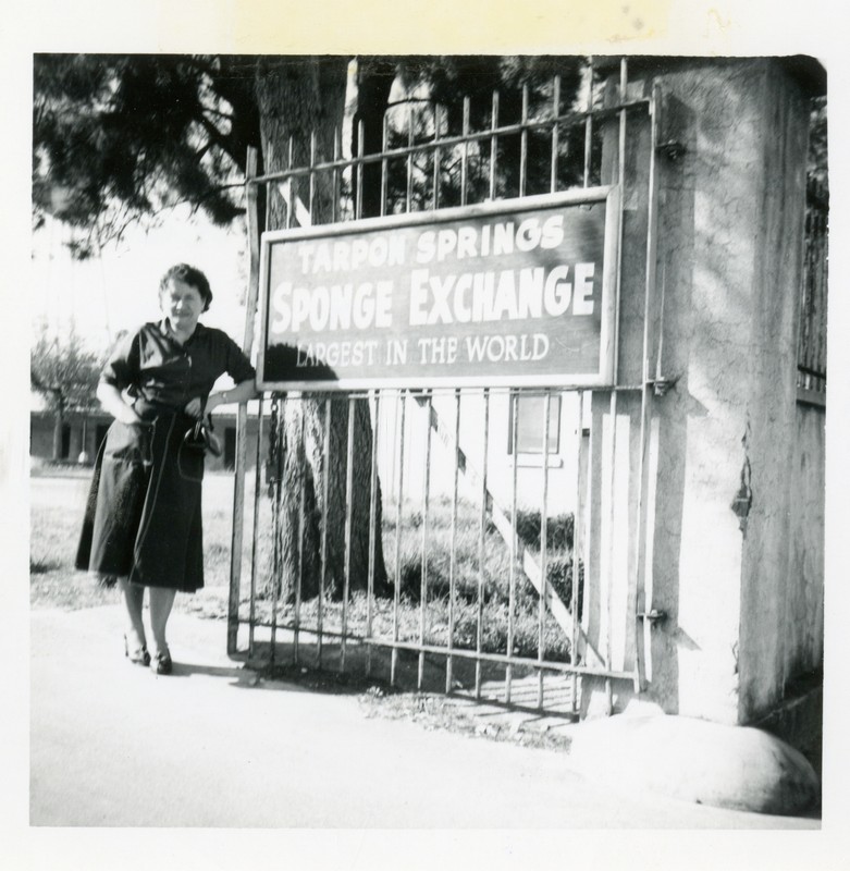 Woman at the gates of the Tarpon Springs Sponge Exchange, circa 1940. 