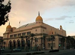 A shot of the Shrine Auditorium during sunset.