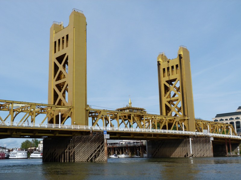 The Tower Bridge's twin spires rise 160 feet above the Sacramento River.