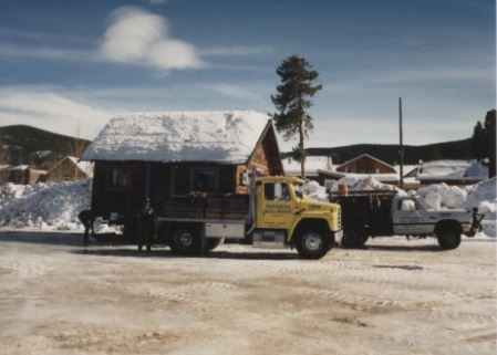 The Niemoth Cabin in transit to the Frisco Historic Park, driving through Frisco.