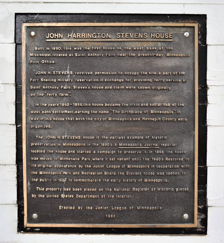 A plaque detailing the history of the house and its preservation 