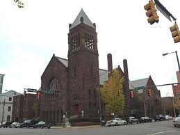 This historic downtown church features the American Romanesque Revival architectural style