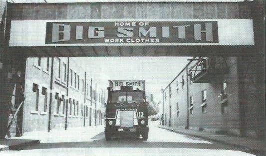 Elevated walk way between factory buildings on Howard Street, undated image.