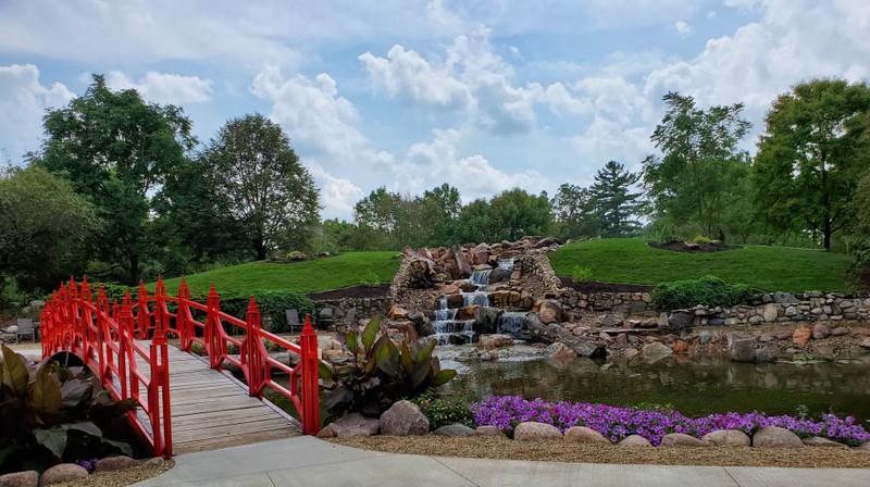 Waterfall, bridge, and pond area in the Botanical Garden 