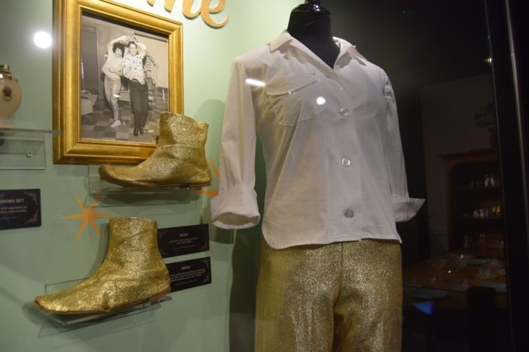 Matching gold lamé pants and boots: one of Cline's stage costumes