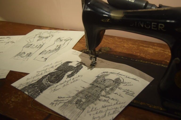 Cline's mother's sewing machine and dress patterns drawn by Cline herself