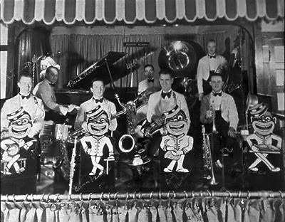 After the repeal of Prohibition, the restaurant became a club at night where musicians played "negro music" behind bandstands featuring racist caricatures of Black porters