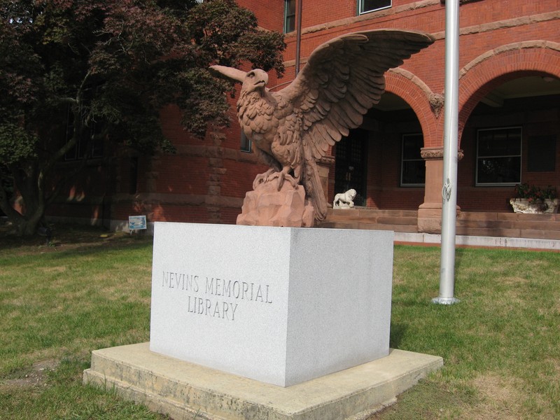 A eagle statue dominates the front of the building.