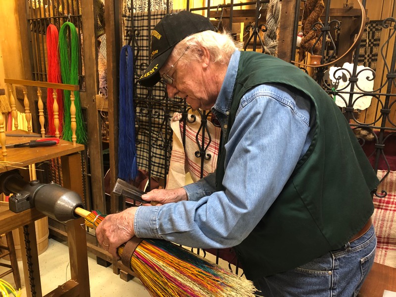 Broom making in the Artisan Center.