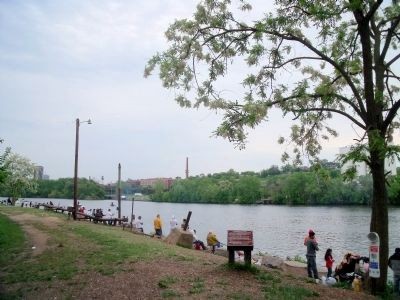A view of the marker in 2010 along with area residents fishing